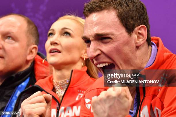Germany's Aljona Savchenko and Germany's Bruno Massot react after the pair skating free skating of the figure skating event during the Pyeongchang...