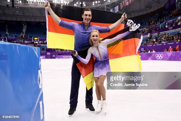 Gold medal winners Aljona Savchenko and Bruno Massot of Germany celebrate during the victory ceremony after the Pair Skating Free Skating at...