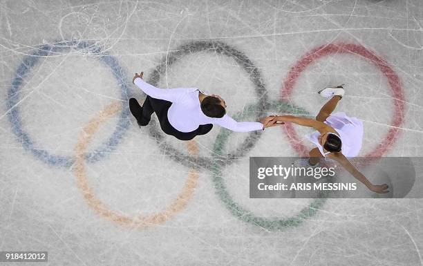 Russia's Natalia Zabiiako and Russia's Alexander Enbert compete in the pair skating free skating of the figure skating event during the Pyeongchang...