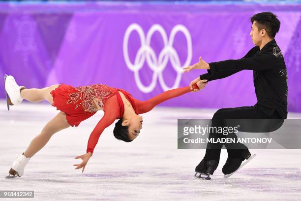 China's Sui Wenjing and China's Han Cong compete in the pair skating free skating of the figure skating event during the Pyeongchang 2018 Winter...