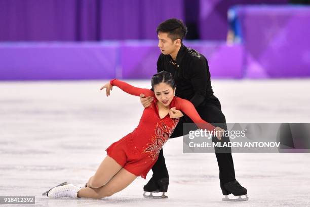 China's Sui Wenjing and China's Han Cong compete in the pair skating free skating of the figure skating event during the Pyeongchang 2018 Winter...