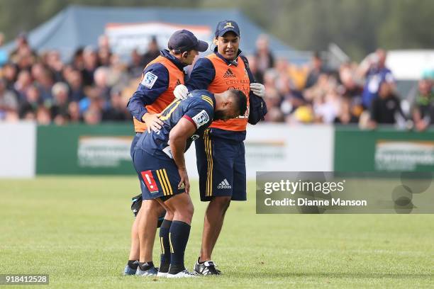 Lima Sopoaga of the Highlanders leaves the field to receive attention to an injury during the Super Rugby trial match between the Highlanders and the...