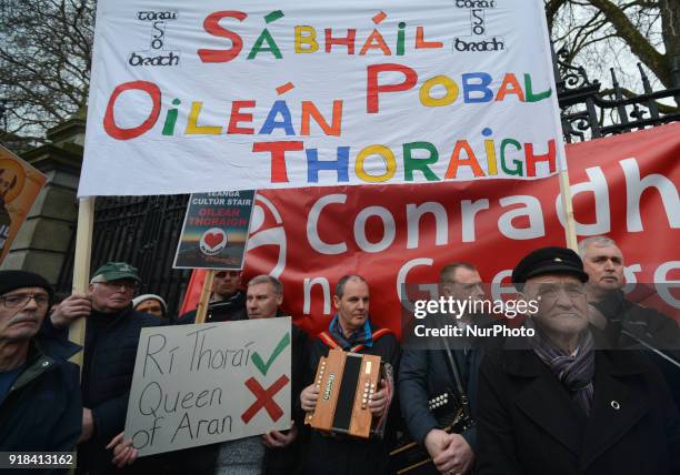 People from mainly Irish-speaking Tory Island, led by the King of Tory Patsy Dan Rodgers , protest outside Leinster House in Dublin against the...