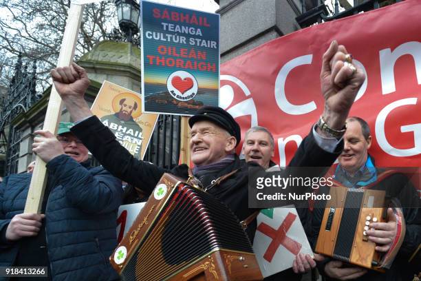 People from mainly Irish-speaking Tory Island, led by the King of Tory Patsy Dan Rodgers , protest outside Leinster House in Dublin against the...