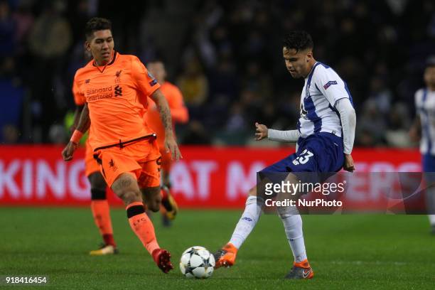 Porto's Mexican defender Diego Reyes in action with Roberto Firmino forward of Liverpool during the UEFA Champions League, match between FC Porto and...