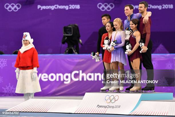 Gold winners Germany's Aljona Savchenko and Germany's Bruno Massot pose on the podium with silver winners China's Sui Wenjing and China's Han Cong ,...