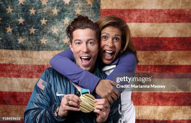 Gold medalist in the Men's Snowboard Halfpipe Shaun White of the United States poses for a portrait with host Hoda Kotb on the Today Show Set on...