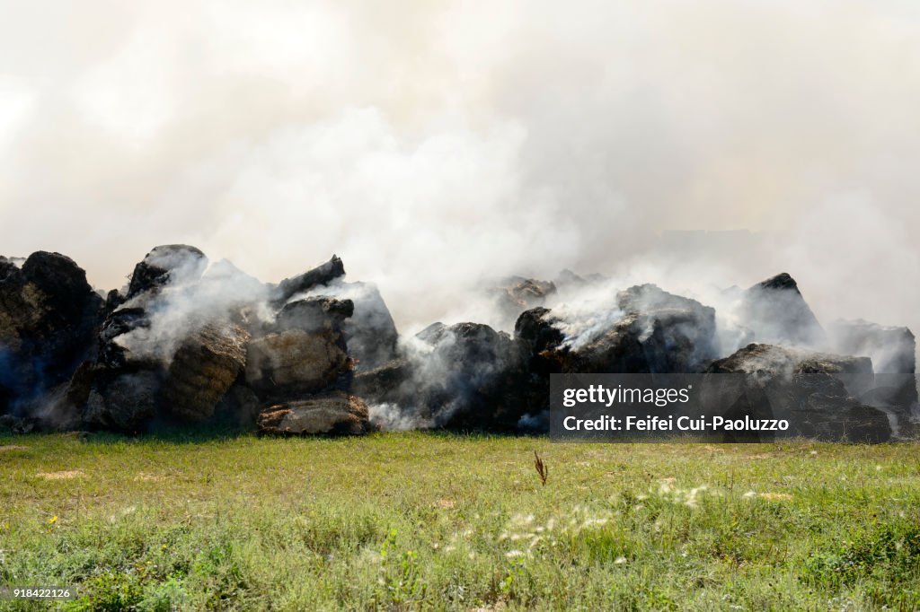 Burning the old haystock near Devils Lake, North Dakota, USA