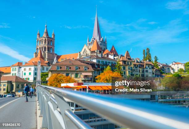 cityscape and railing over lausanne in a sunny day - kanton waadt stock-fotos und bilder