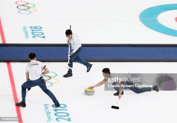 Kosuke Morzumi, Tetsuro Shimizu and Tsuyoshi Yamaguchi compete during the Curling Men's Round Robin Session 3 held at Gangneung Curling Centre on...