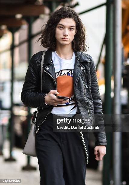 Model McKenna Hellam is seen wearing a leather jacket and black pants outside the Esteban Cortazar show during New York Fashion Week: Women's A/W...