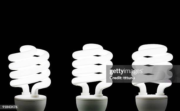 three energy saving bulb white light - resourceful bildbanksfoton och bilder