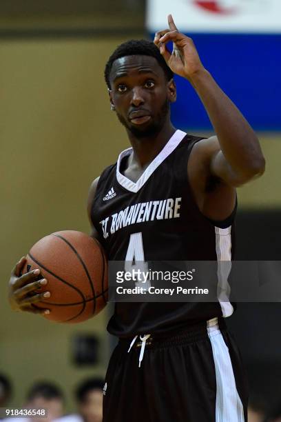 Nelson Kaputo of the St. Bonaventure Bonnies talks to his team before running a play against the La Salle Explorers during the first half at Tom Gola...