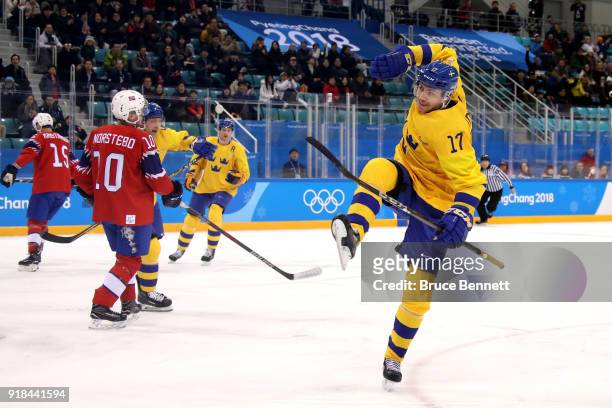 Par Lindholm of Sweden celebrates after scoring the opening goal during the Men's Ice Hockey Preliminary Round Group C game between Norway and Sweden...
