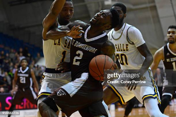 Matt Mobley of the St. Bonaventure Bonnies is fouled by Johnnie Shuler of the La Salle Explorers during the first half at Tom Gola Arena on February...