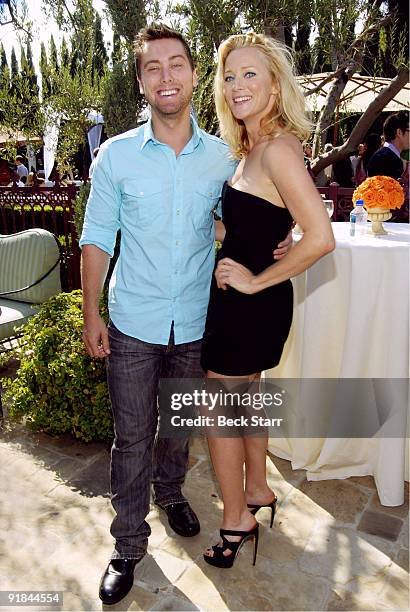 Singer Lance Bass and actress Angela Featherstone attend to the 8th Annual GLEH Garden Party on October 11, 2009 in Los Angeles, California.