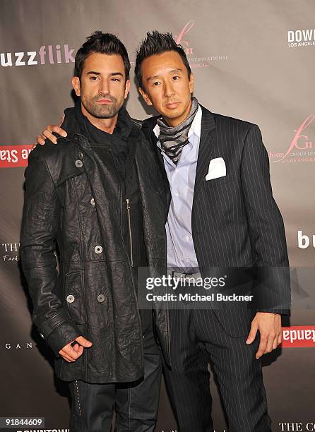 Designer Eric Kim and his muse arrives at Fashion Group International of Los Angeles' "Meet The Designers" at the Standard Hotel on October 12, 2009...