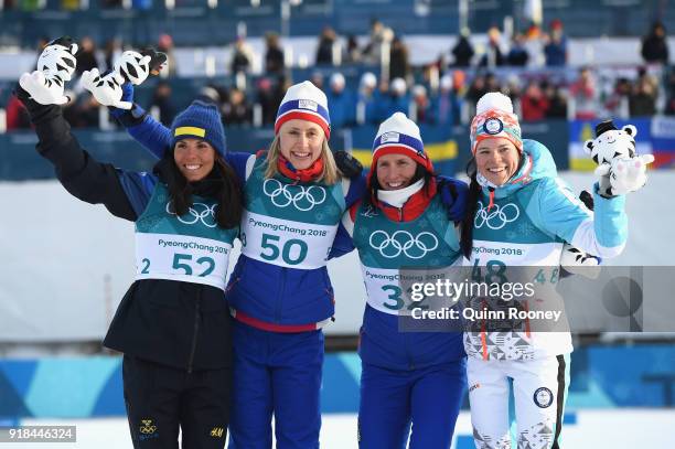 2nd placed Charlotte Kalla of Sweden, 1st placed Ragnhild Haga of Norway and joint 3rd placed Marit Bjoergen of Norway and Krista Parmakoski of...