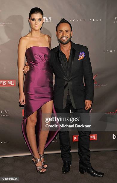 Model Lisa Blades and designer Nick Verreos arrives at Fashion Group International of Los Angeles' "Meet The Designers" at the Standard Hotel on...