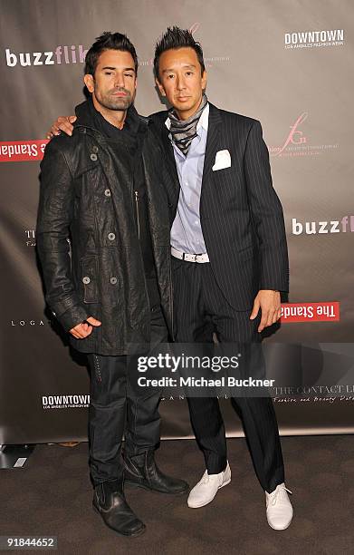 Designer Eric Kim and his muse arrives at Fashion Group International of Los Angeles' "Meet The Designers" at the Standard Hotel on October 12, 2009...