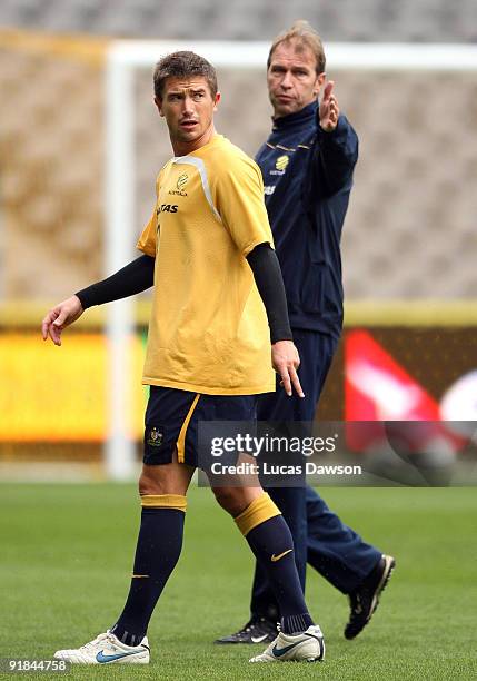 Australian Socceroo coach Pim Verbeek talks with Hary Kewell of the Socceroos at an Australian Socceroos training session at at Etihad Stadium on...