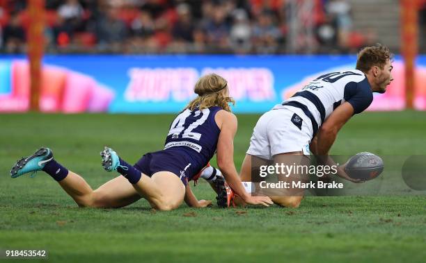 Stefan Giro of Fremantle and Jackson Thurlow of Geelong during the AFLX match between Geelong and Fremantle at Hindmarsh Stadium on February 15, 2018...