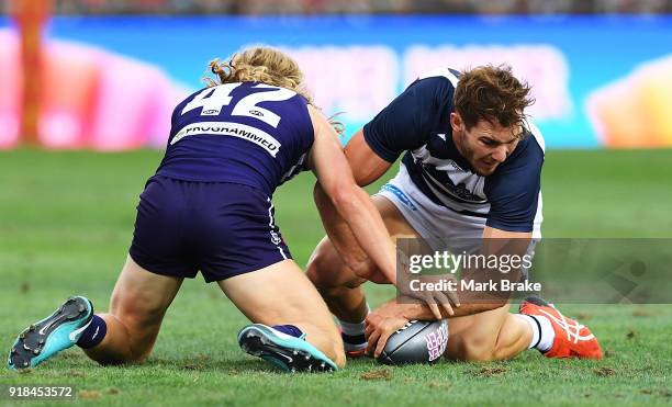 Stefan Giro of Fremantle and Jackson Thurlow of Geelong during the AFLX match between Geelong and Fremantle at Hindmarsh Stadium on February 15, 2018...