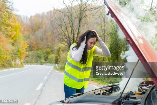 broken car on the road - engine failure stock pictures, royalty-free photos & images