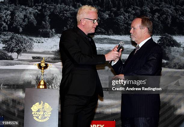 Chris Evans chats to Sir Terry Matthews, owner of The Celtic Manor Resort, during the ' A Year to Go' Gala Dinner at The Celtic Manor Resort on...