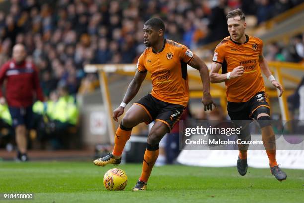 Ivan Cavaleiro and Barry Douglas of Wolverhampton Wanderers during the Sky Bet Championship match between Wolverhampton and Queens Park Rangers at...