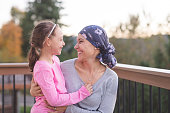 Mother with Cancer Hugging Daughter