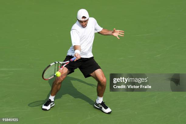 Benjamin Becker of Germany returns a shot to compatriot Tommy Haas during day three of 2009 Shanghai ATP Masters 1000 at the Qi Zhong Tennis Centre...