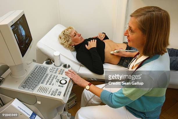 Family doctor conducts a real ultrasound scan of an assistant in this photo illustration on October 13, 2009 in Berlin, Germany. German political...