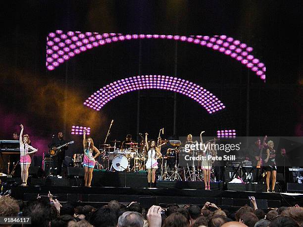 Girls Aloud perform on stage at Wembley Stadium on September 18, 2009 in London, England.