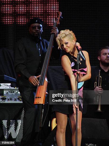 Sarah Harding of Girls Aloud performs on stage at Wembley Stadium on September 18, 2009 in London, England.