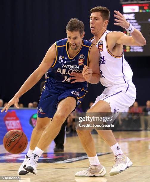 Brisbane Player Daniel Kickert competes with Sydney player Dane Pineau during the round 19 NBL match between the Brisbane Bullets and the Sydney...