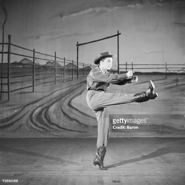 American actress, singer and dancer Allyn Ann McLerie of the American Ballet Theatre dances the role of The Cowgirl in 'Rodeo', with music by Aaron...