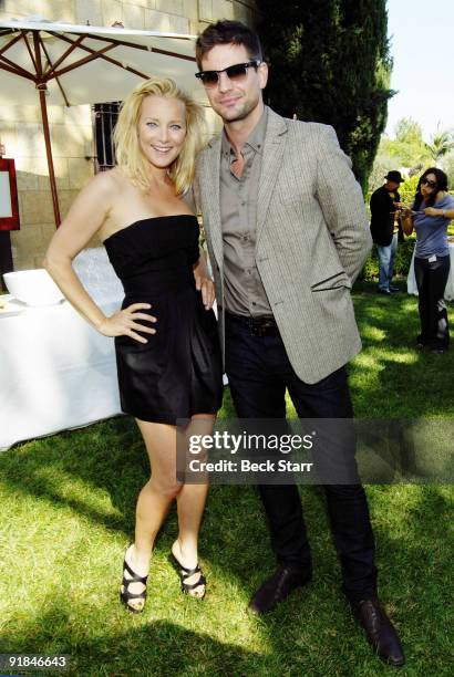 Actress Angela Featherstone and Actor Gale Harold attend the 8th Annual GLEH Garden Party on October 11, 2009 in Los Angeles, California.