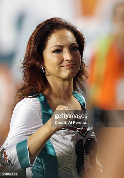 Singer Gloria Estefan visits the field as part of Hispanic Heritage Month and checks out the action during the Monday Night Football game between the...