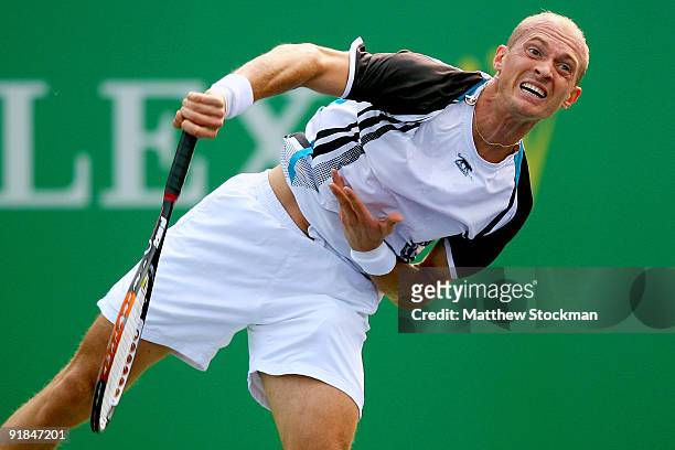 Nikolay Davydenko of Russia serves to Igor Kunitsyn of Russia during their Round two match on day three of the 2009 Shanghai ATP Masters 1000 at Qi...