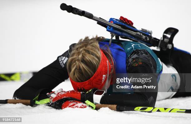 Franziska Preuss of Germany reacts at the finish during the Women's 15km Individual Biathlon at Alpensia Biathlon Centre on February 15, 2018 in...