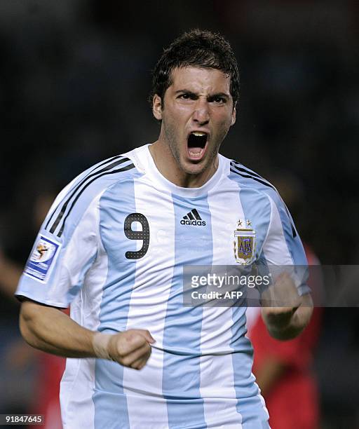 Argentina's forward Gonzalo Higuain celebrates after scoring a goal against Peru during their FIFA World Cup South Africa-2010 qualifier football...