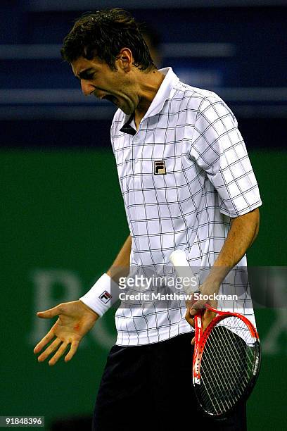 Marin Cilic of Croatia reacts to a lost point against Tomas Berdych of the Czech Republic on day three of the 2009 Shanghai ATP Masters 1000 at Qi...