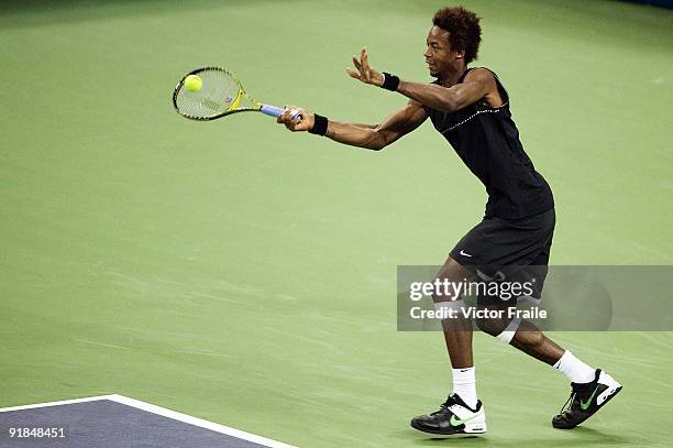 Gael Monfils of France returns a shot to his compatriot Paul-Henri Mathieu on day three of 2009 Shanghai ATP Masters 1000 at the Qi Zhong Tennis...