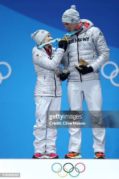 Gold medalists Aljona Savchenko and Bruno Massot of Germany celebrate during the medal ceremony for the Pair Skating Free Skating on day six of the...