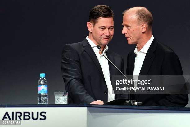 Airbus chief excecutive officer Tom Enders and Airbus chief financial officer Harald Wilhelm speak together during the Annual press conference to...