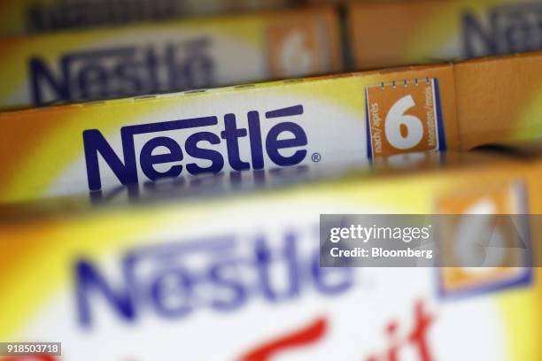 Boxes of Nestle infant food stand on display in a shop at the Nestle SA headquarters in Vevey, Switzerland, on Thursday, Feb. 15, 2018. Since taking...