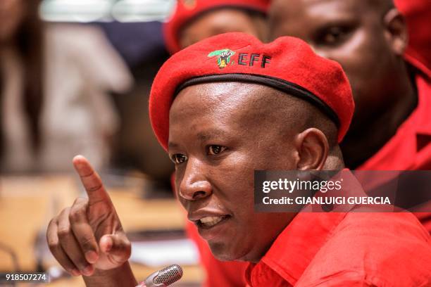 South African opposition party Economic Freedom Fighters leader Julius Malema gestures as he delivers a speech during a press conference on February...