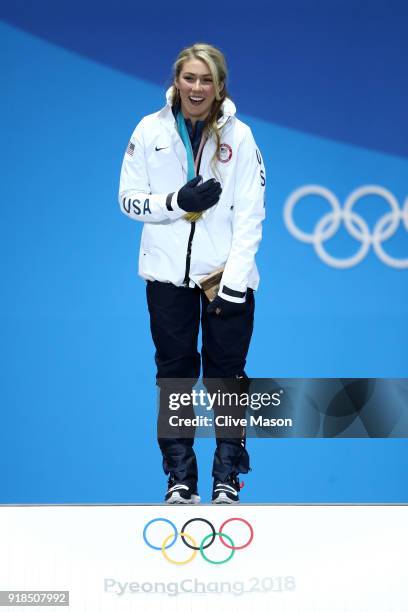 Gold medalist Mikaela Shiffrin of the United States celebrates during the medal ceremony for Alpine Skiing - Ladies' Giant Slalom on day six of the...