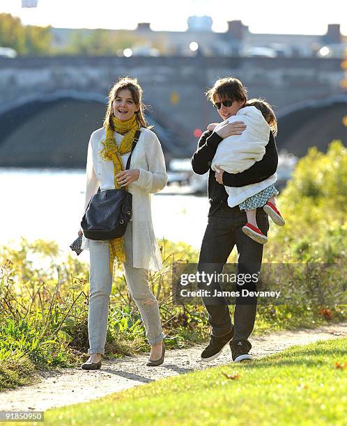 Katie Holmes, Suri Cruise and Tom Cruise visit Charles River Basin on October 10, 2009 in Cambridge, Massachusetts.